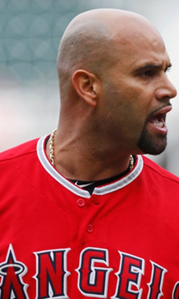 Pujols ties Musial on RBI list; Angels beat Twins 2-1
